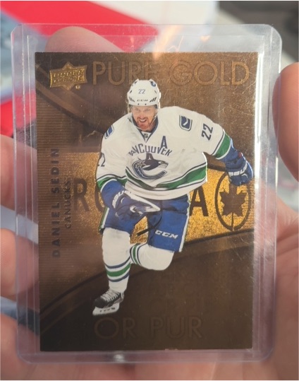 2016-17 Upper Deck Tim Hortons Pure Gold #PG-14 Daniel Sedin — front
