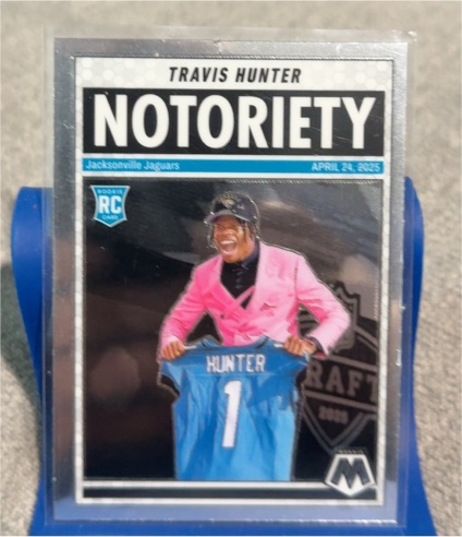 2025 Panini Mosaic #12 Travis Hunter Notoriety — front