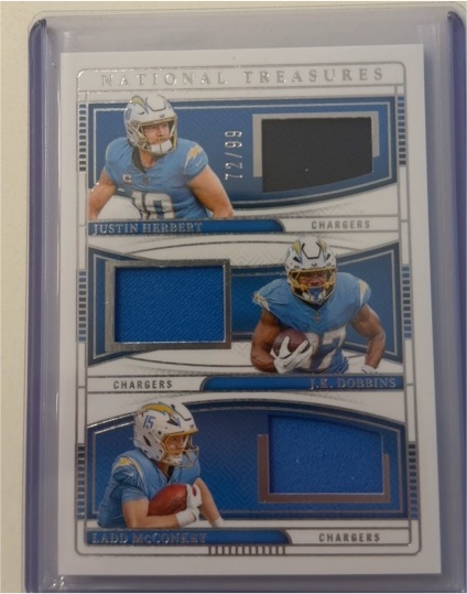 2024 Panini National Treasures #77 Justin Herbert / J.K. Dobbins / Ladd McConkey — front