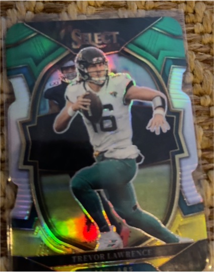 2022 Panini Select #41 Trevor Lawrence Green and Yellow Prizm Die Cut — front