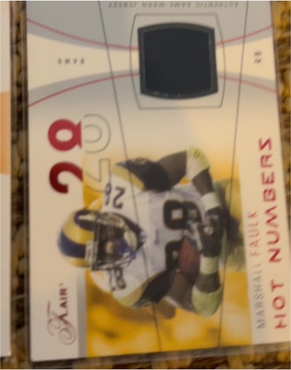 2004 Fleer Flair Hot Numbers #20 Marshall Faulk — front
