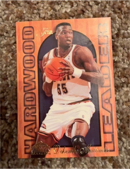 1995-96 Fleer Flair Hardwood Leader #7 Dikembe Mutombo — front