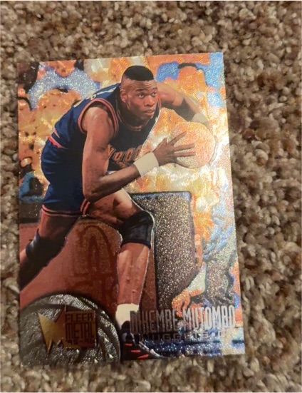 1995-96 Fleer Metal #25 Dikembe Mutombo — front