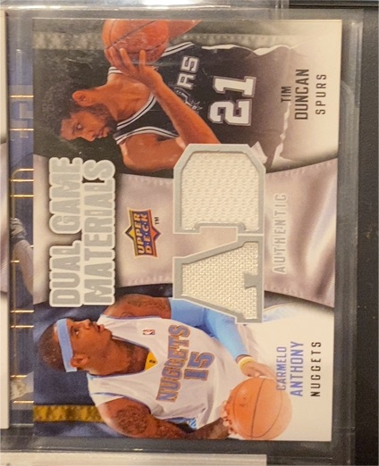 2009-10 Upper Deck Dual Game Materials #DG-DA Tim Duncan / Carmelo Anthony — front