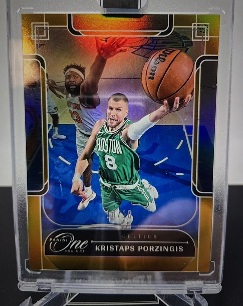 2023-24 Panini One and One #10 Kristaps Porzingis — front