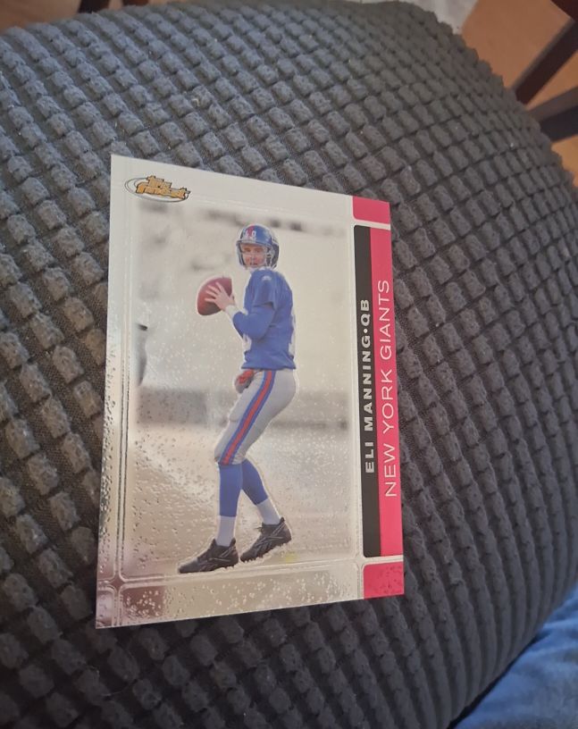 2007 Topps Finest #11 Eli Manning — front