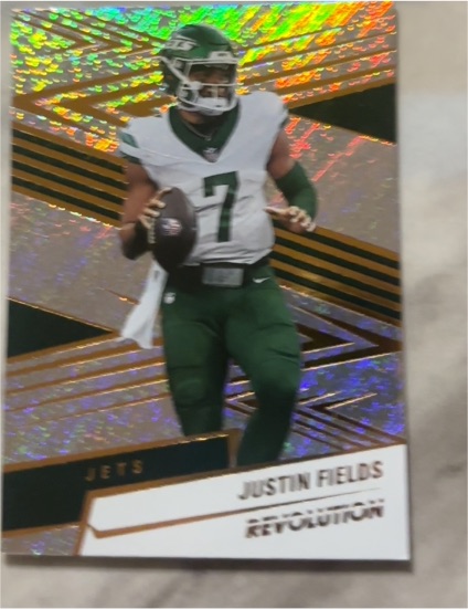 2025 Panini Revolution #168 Justin Fields — front