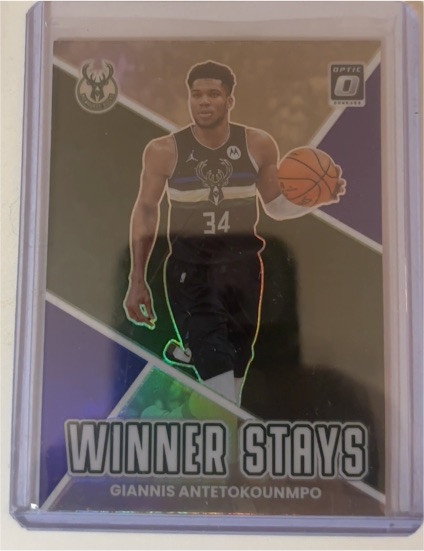 2022-23 Donruss Optic #12 Giannis Antetokounmpo Winner Stays — front