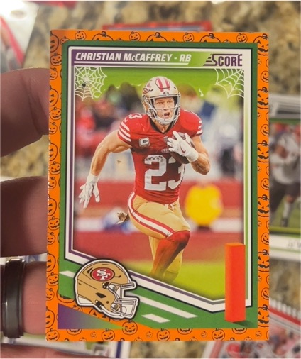 2025 Panini Score-A-Treat #238 Christian McCaffrey — front