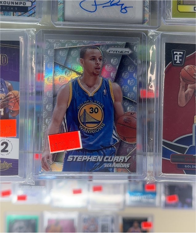 2014 Panini Prizm #12 Stephen Curry — front