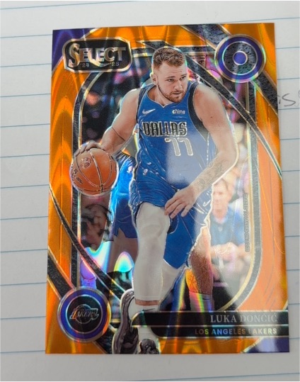 2024-25 Panini Select #265 Luka Doncic Courtside Orange Flash Prizm — front