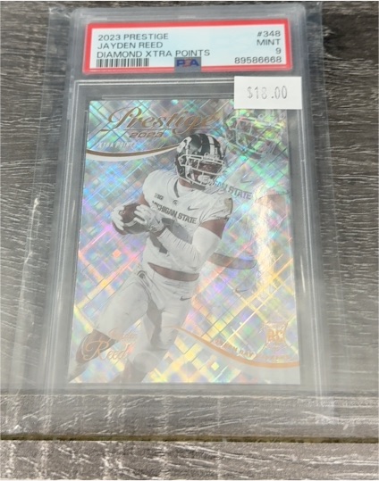 2023 Panini Prestige #348 Jayden Reed Diamond Xtra Points — front
