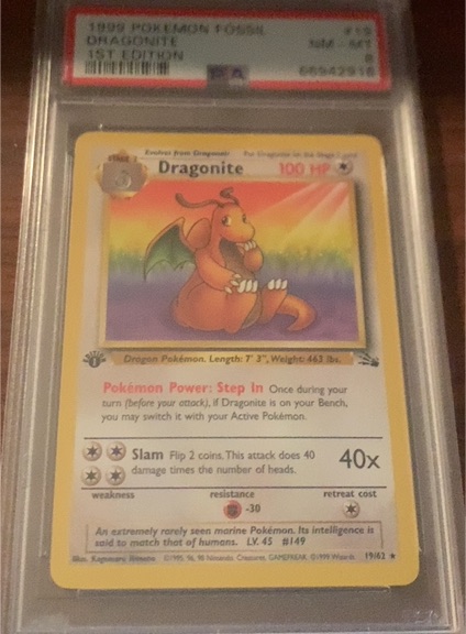 1999 Pokémon Fossil #4 Dragonite — front