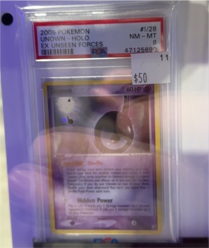 2005 Pokemon #1 Unown Holo EX Unseen Forces — front