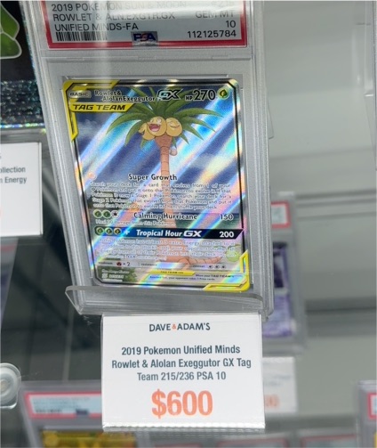2019 Pokemon Unified Minds #215 Rowlet & Alolan Exeggutor GX — front