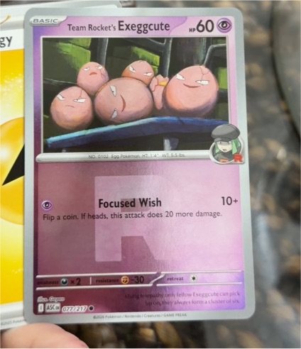 2022 Pokémon TCG Ascended Heroes #077 Team Rocket's Exeggcute — front
