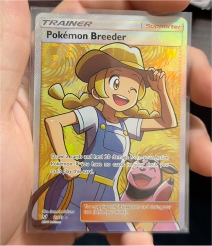 2017 Pokémon Sun & Moon Shining Legends #73 Pokémon Breeder — front