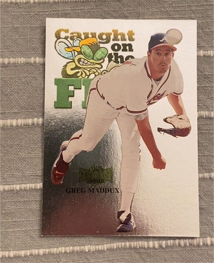1999 Skybox Metal Universe #243 Greg Maddux — front