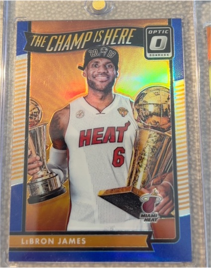 2016-17 Donruss Optic #1 LeBron James The Champ Is Here — front