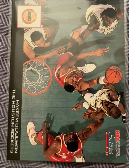 1993-94 Hoops Scoops #HS10 Hakeem Olajuwon Houston Rockets — front