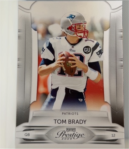 2009 Playoff Prestige #57 Tom Brady — front