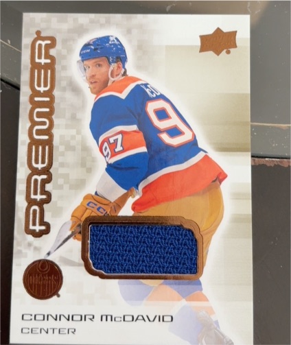 2024-25 Upper Deck Premier Bronze Jersey Connor McDavid — front