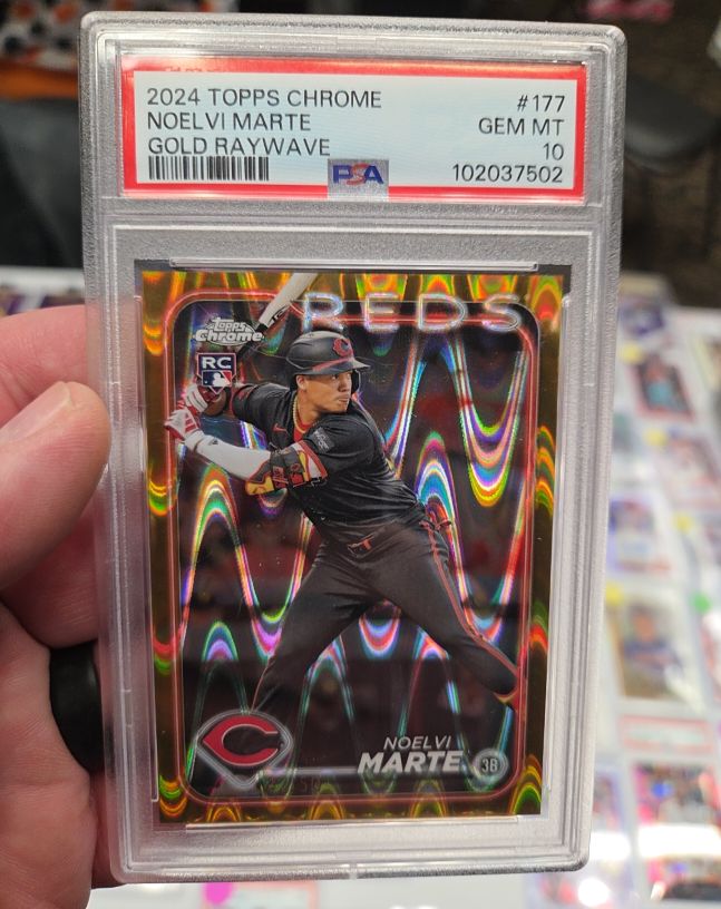 2024 Topps Chrome #177 Noelvi Marte Gold Raywave — front