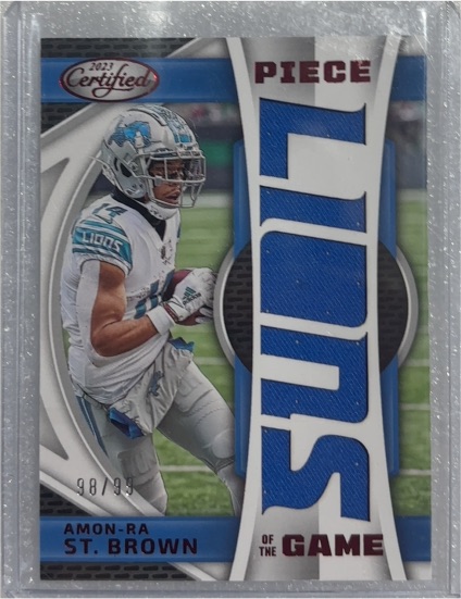 2023 Panini Certified #POG-11 Amon-Ra St. Brown Piece Of The Game — front