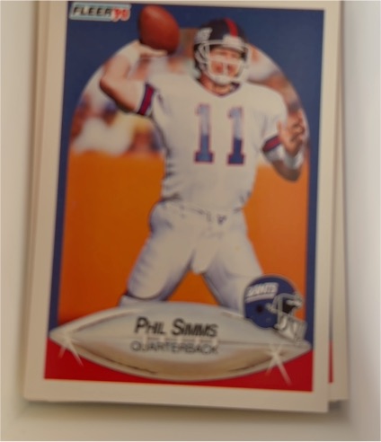 1990 Fleer #76 Phil Simms — front