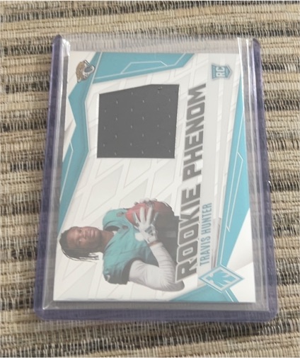 2025 Panini Phoenix #PJY-22 Travis Hunter Rookie Phenom Patch — front