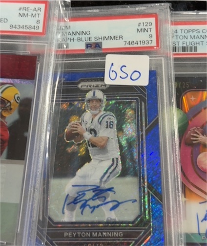 2014 Panini Prizm #129 Peyton Manning — front