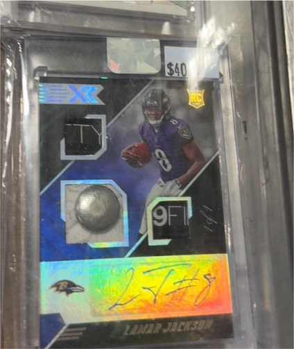 2018 Panini XR #RPA Lamar Jackson Rookie Patch Autograph — front