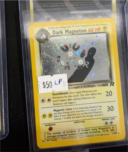 2000 Pokémon Team Rocket #11 Dark Magneton — front