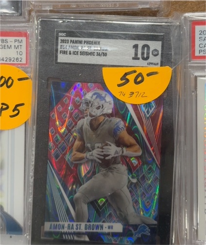 2023 Panini Phoenix #64 Amon-Ra St. Brown — front