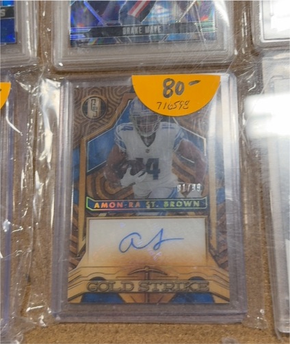 2022 Panini Gold Standard Gold Strike #GS-ARSB Amon-Ra St. Brown — front