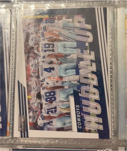 2022 Panini Score #HU-DAL Dallas Cowboys Huddle Up — front