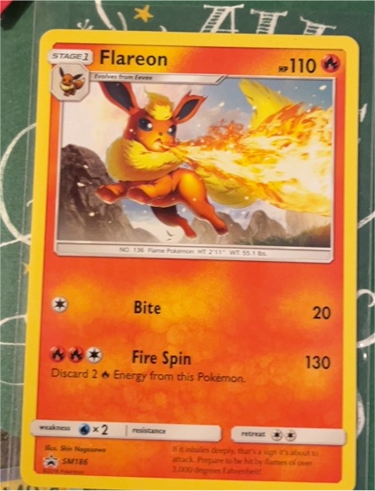 Pokemon Sun & Moon SM186 Flareon Black Star Promo — front