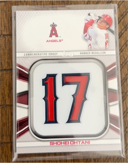 2022 Topps Series 1 Commemorative Jersey Number Medallion Shohei Ohtani — front
