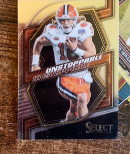 2023 Panini Select Draft Picks #UN-18 Trevor Lawrence Unstoppable — front