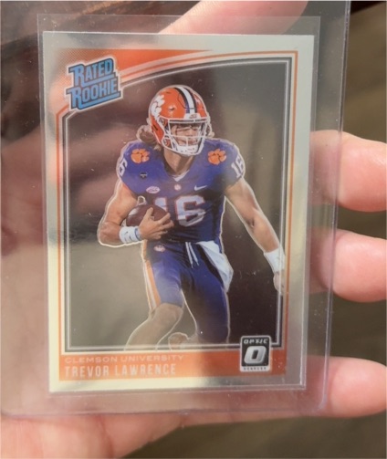 2021 Panini Chronicles Draft Picks Donruss Optic #201 Trevor Lawrence — front