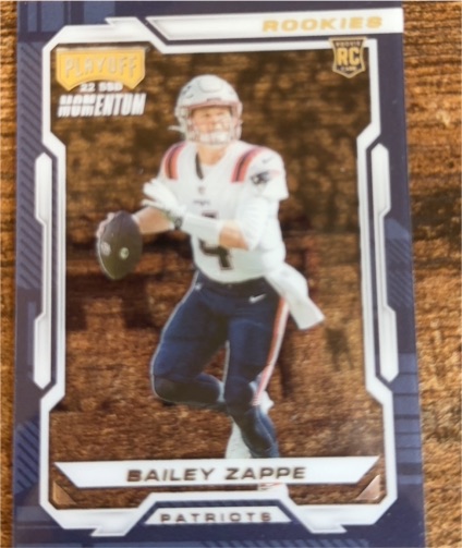 2022 Panini Chronicles #PMR-26 Bailey Zappe Playoff Momentum Rookies — front