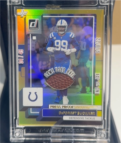 2022 Panini Donruss #55 DeForest Buckner Press Proof Yellow Game Used Ball — front