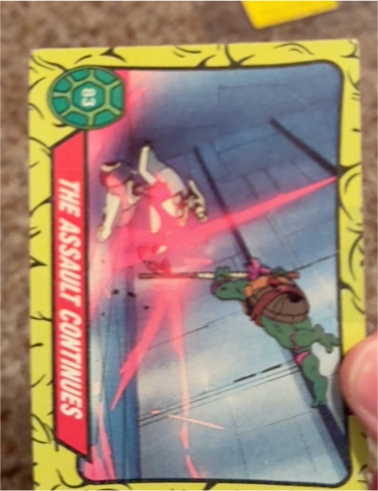 1989 Topps Teenage Mutant Ninja Turtles #83 The Assault Continues — front