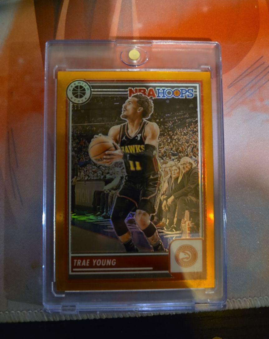 2023-24 Panini NBA Hoops Premium Stock #82 Trae Young — front