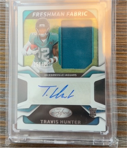 2025 Panini Certified Freshman Fabric #FBC-THR Travis Hunter — front