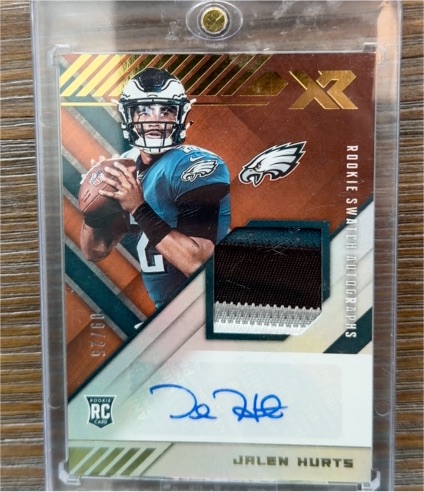 2020 Panini XR Rookie Swatch Autographs #RSA-JU Jalen Hurts — front