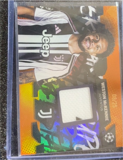 2025-26 Topps UEFA CC Juventus Weston McKennie Player Worn Patch Orange #RM-NB — front