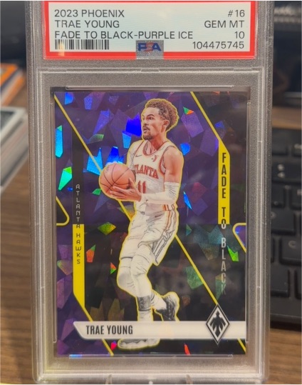 2023-24 Panini Phoenix #16 Trae Young Fade To Black — front