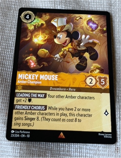 2023 Disney Lorcana Whispers in the Well #23 Mickey Mouse Amber Champion — front