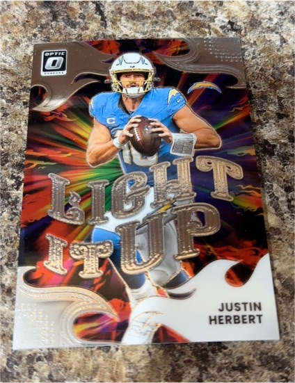 2025 Donruss Optic #12 Justin Herbert Light It Up — front